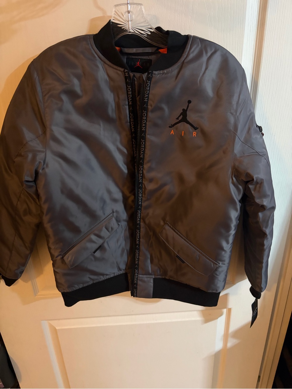 Jordan Kids' Gray Puffer Jacket with Black Trim and Orange Accent